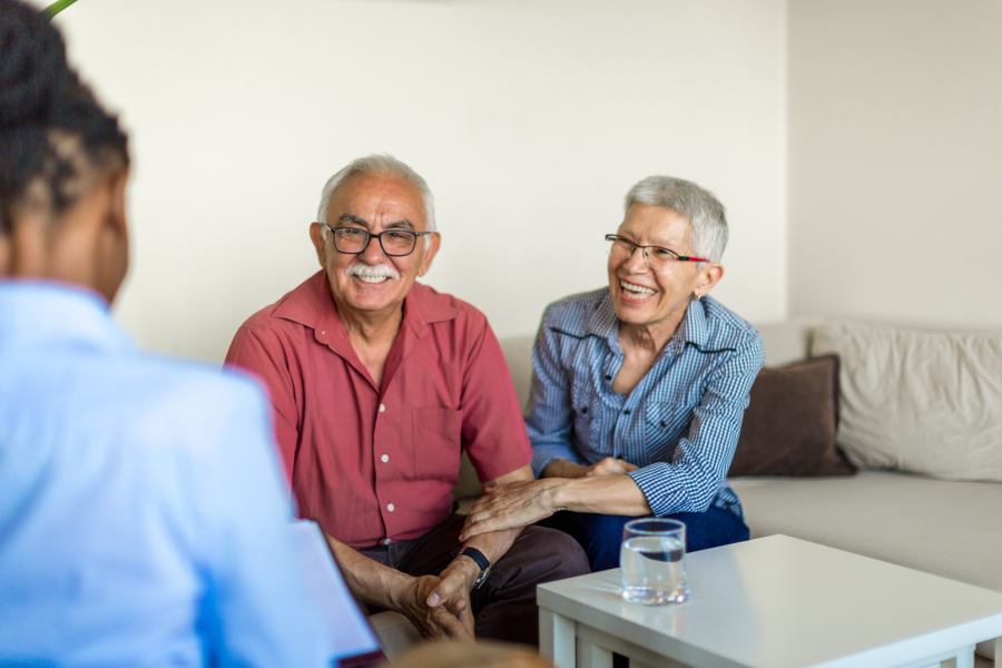 Elderly couple engages in communication partner training.